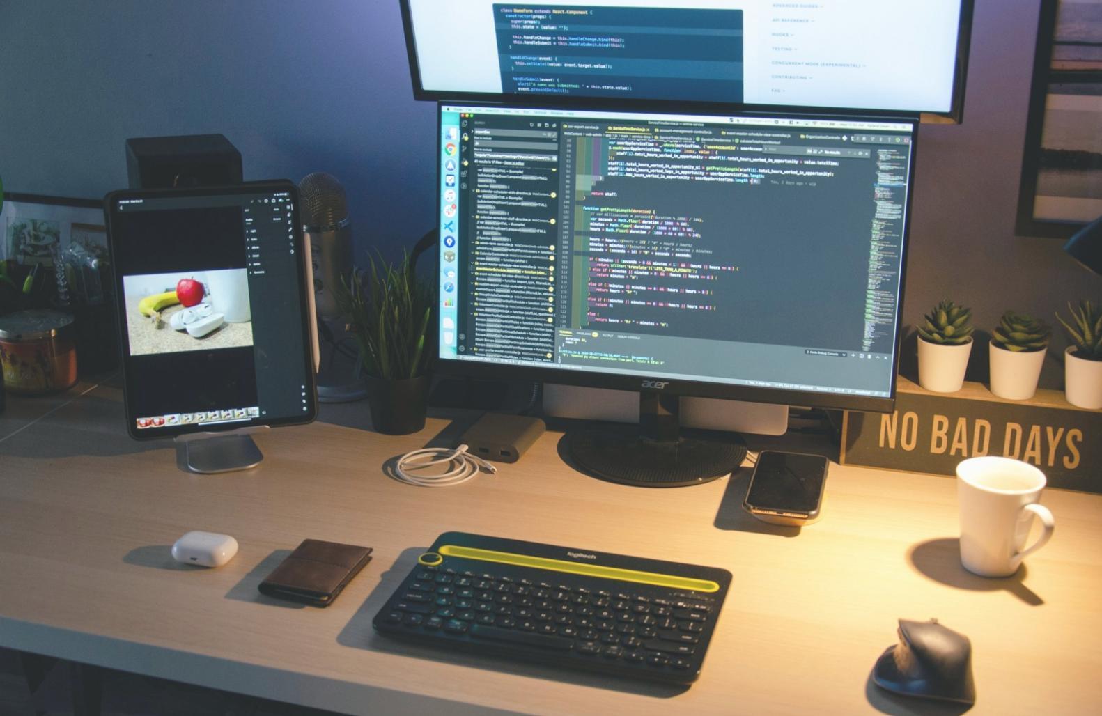 Student collaborative workspace with multiple workstations and project displays